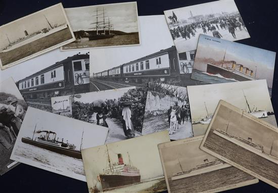 A large collection of postcards, four albums, a photo album, loose postcards, railway related photographs